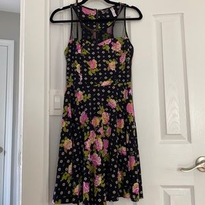 Black sleeveless dress with pink flowers
